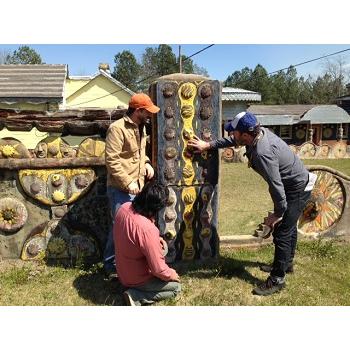 International Artifacts and Parma Conservation evaluating sculptures at Pasaquan